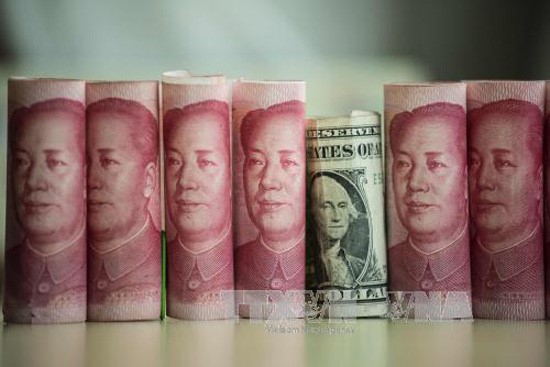 Trung Quốc muốn giảm nguy cơ thiếu hụt thanh khoản trong hệ thống tài chính . Ảnh: AFP/TTXVN