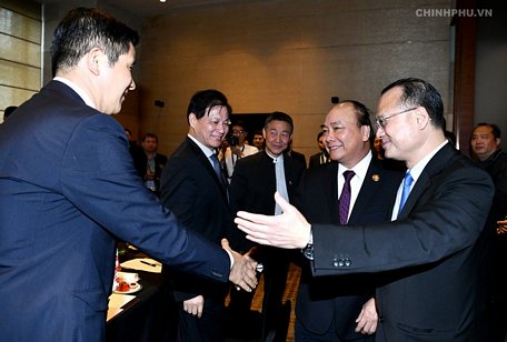  Thủ tướng Nguyễn Xuân Phúc đến dự cuộc tọa đàm với các tập đoàn hàng đầu Trung Quốc. Ảnh: VGP/Quang Hiếu