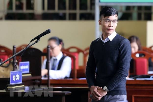  Bị cáo Đỗ Minh Quang khai báo tại tòa. (Ảnh: Trung Kiên/TTXVN)