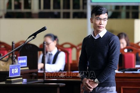 Bị cáo Vũ Minh Quang khai báo tại tòa. Ảnh: Trung Kiên/TTXVN