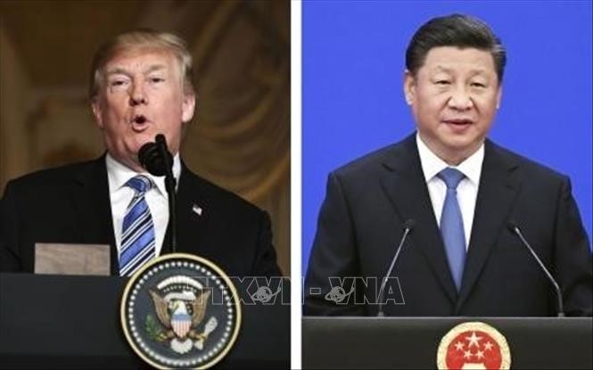 Tổng thống Mỹ Donald Trump (trái) và Chủ tịch Trung Quốc Tập Cận Bình. Ảnh: Kyodo/TTXVN
