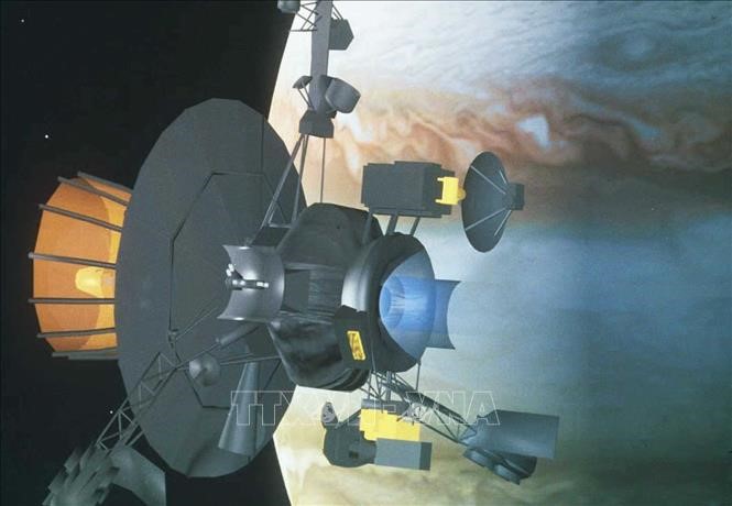 Hình ảnh mô phỏng tàu vũ trụ Galileo đi vào quỹ đạo sao Mộc. Ảnh: AFP/TTXVN
