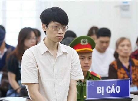  Bị cáo Nguyễn Anh Tú tại phiên tòa. Ảnh: Doãn Tấn/TTXVN
