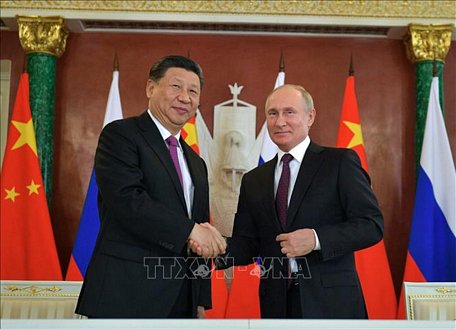 Tổng thống Nga Vladimir Putin (phải) và Chủ tịch Trung Quốc Tập Cận Bình trong cuộc gặp ở Moskva ngày 5/6/2019. Ảnh: AFP/TTXVN