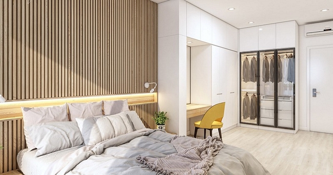 Tủ quần áo, bàn làm việc thiết kế âm tường khiến phòng ngủ càng thêm rộng rãi.
