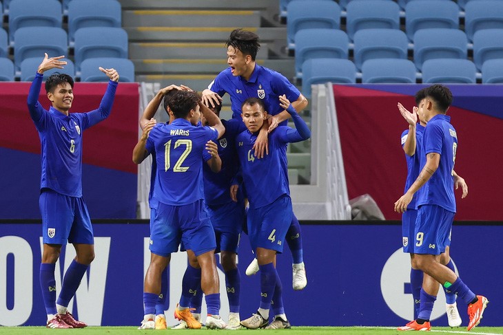 Niềm vui của các cầu thủ U23 Thái Lan - Ảnh: AFP