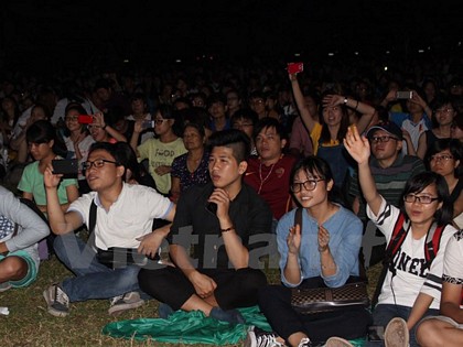 Hơn 5.000 bạn trẻ tham dự chương trình WildFest - lễ hội chiếu phim và ca nhạc ngoài trời về động vật hoang dã ngoài trời. (Ảnh: PV/Vietnam+)