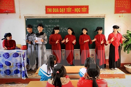 Giờ học hát Xoan của học sinh Trường trung học cơ sở Kim Đức, thành phố Việt Trì. (Ảnh: Trung Kiên/TTXVN)