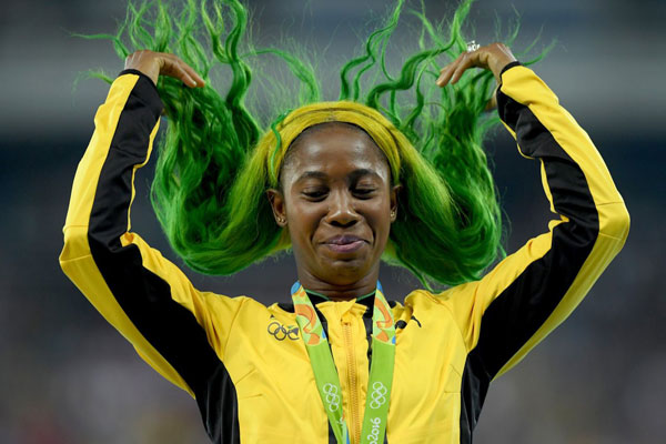 Shelly-Ann Fraser-Pryce, VĐV đoạt HC đồng 100m của nữ không ngại khoe mái tóc vàng xanh, y hệt màu cờ của Jamaica quê hương cô.