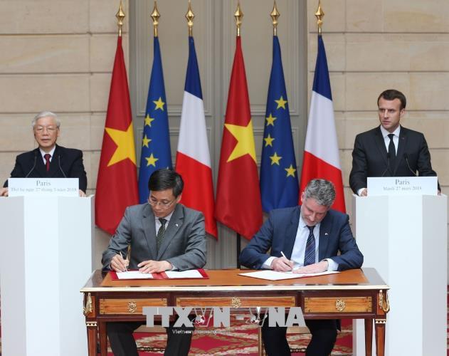 Lễ ký kết Chương trình hợp tác giai đoạn 2018 - 2019 giữa Bộ Tư pháp Việt Nam và Bộ Tư pháp Pháp. Ảnh: Trí Dũng/TTXVN.