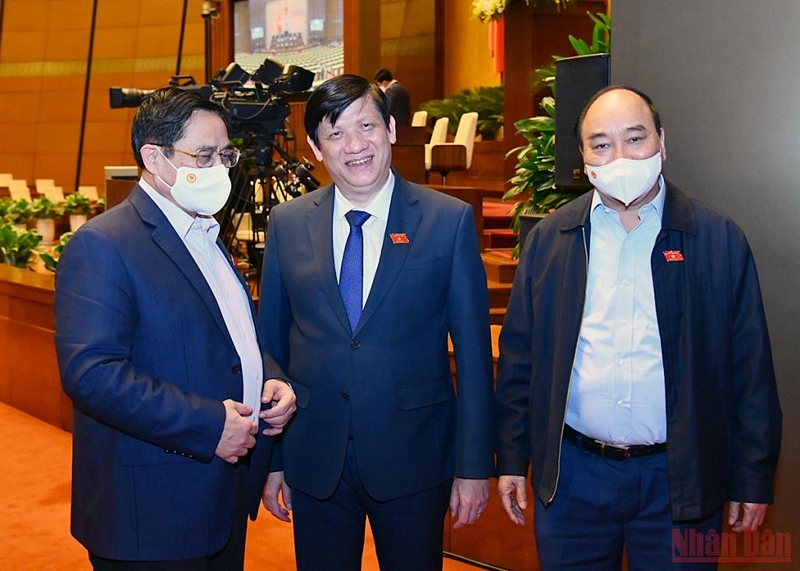 Chủ tịch nươc Nguyễn Xuân Phúc, Thủ tướng Phạm Minh Chính và Bộ trưởng Y tế Nguyễn Thanh Long tại phiên chất vấn.