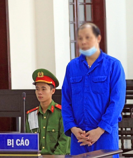 Bị cáo Nguyễn Quốc Tuấn.